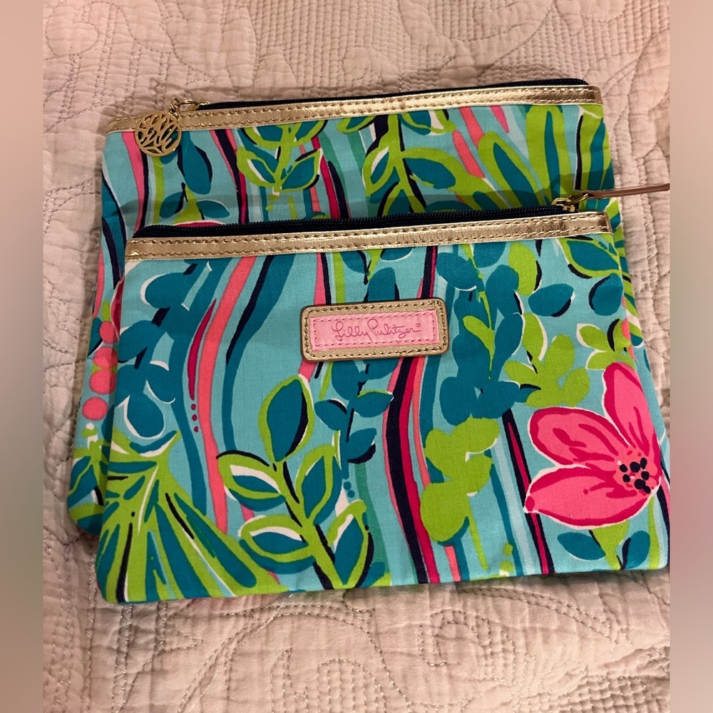 EC Never Used two Lilly Pulitzer Pouches. Pink Lining.